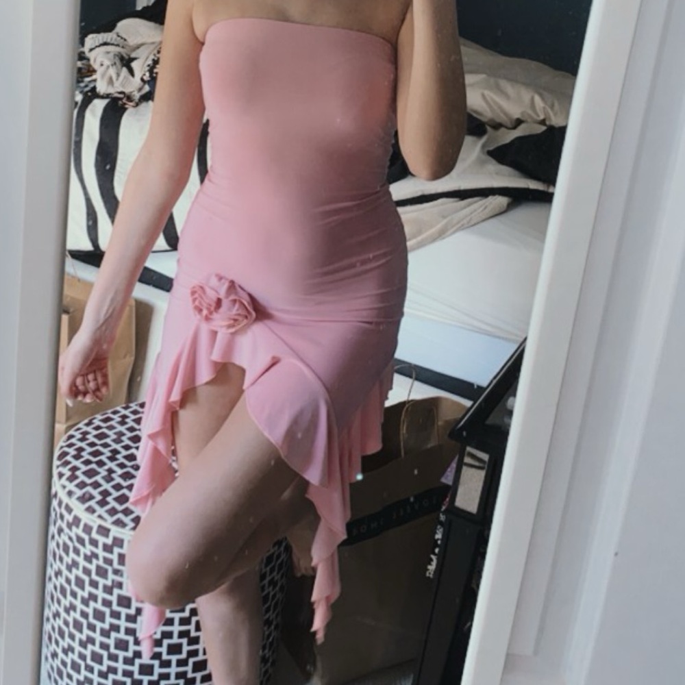 Pink strapless mini dress with flower detail